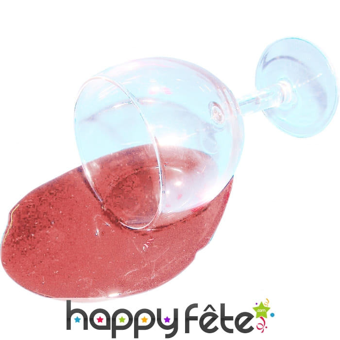 Faux verre de vin rosé renversé