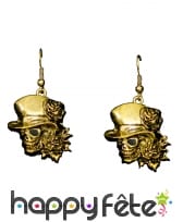 Boucles d'oreilles dorées crane avec chapeau